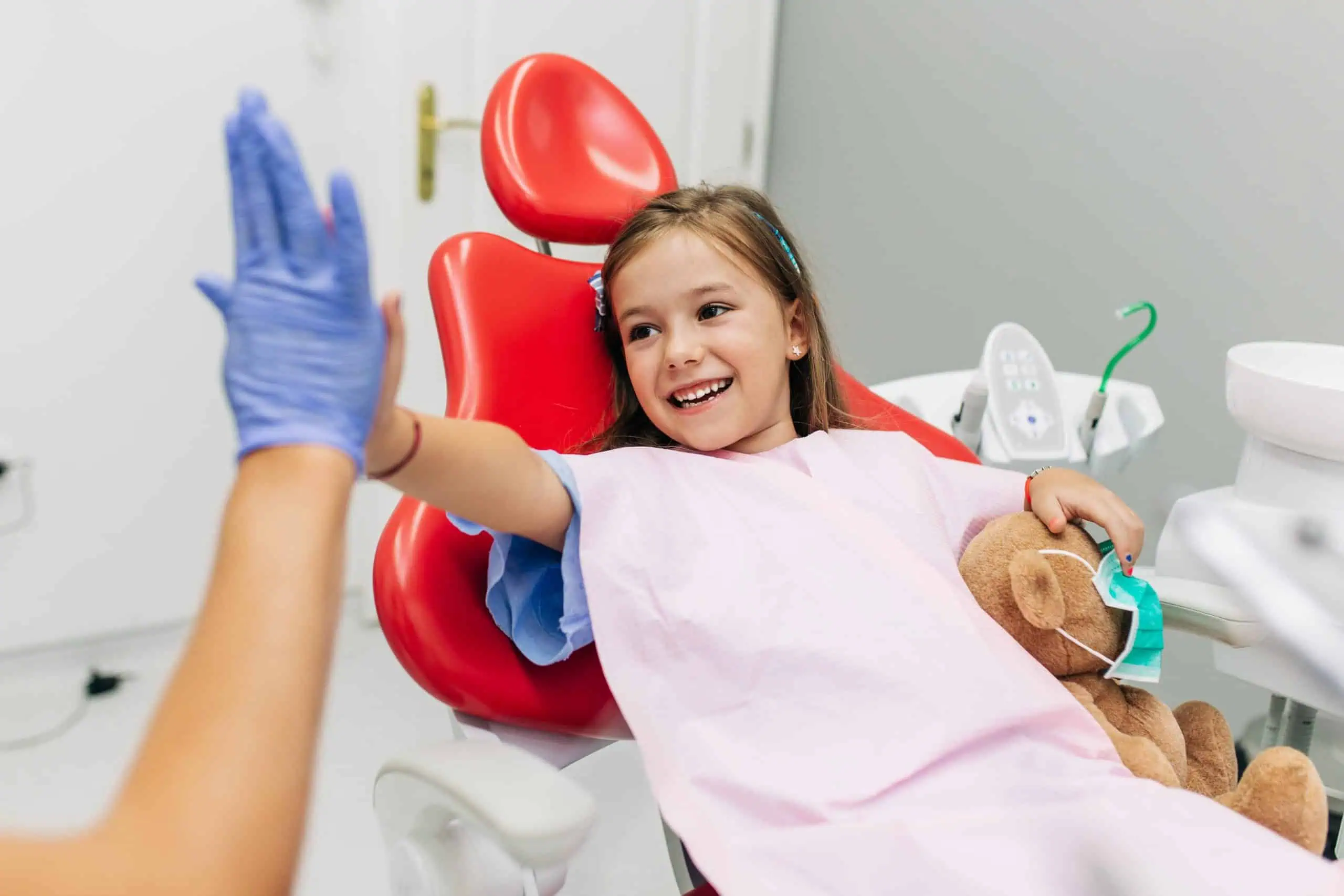 girl at pediatric dentist